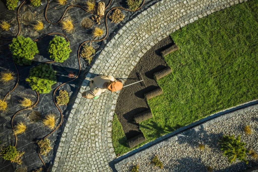 Designing Outdoor Living Spaces – Custom Patios, Decks & Walkways for Your Garden Retreat